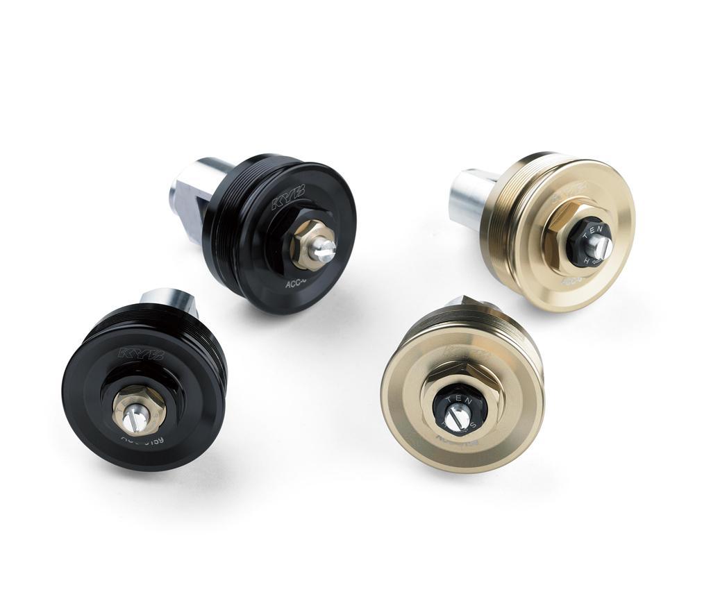 Złote nakrętki widelca przedniego