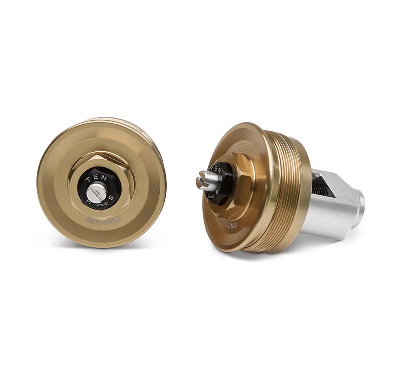 Złote nakrętki widelca przedniego